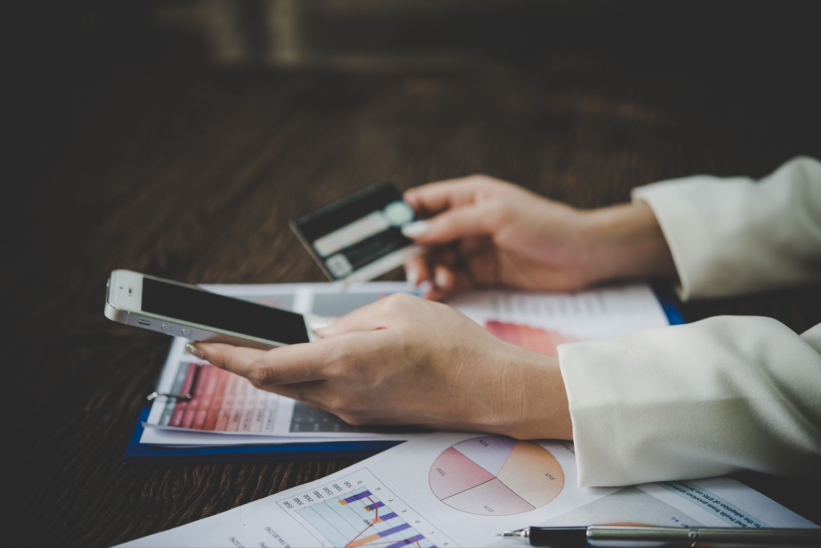 Close up of woman using credit card for payment